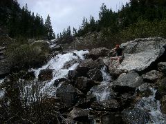 Rest stop by a stream while hiking in to Death Canyon